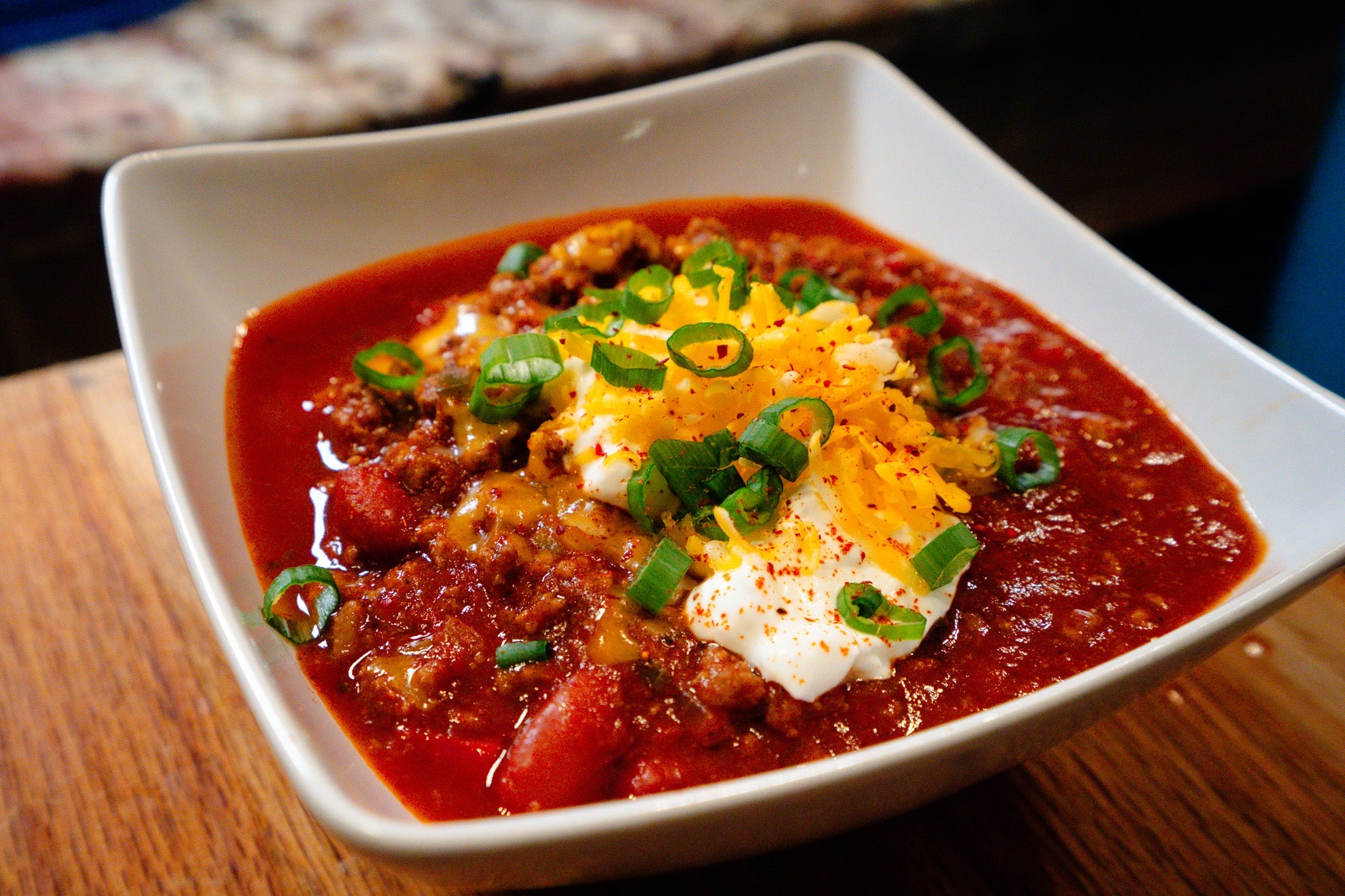 Delicious bowl of 3 Pepper Southern Chili featuring bold flavors, vibrant peppers, and a rich broth made with Chilau Stew Base.