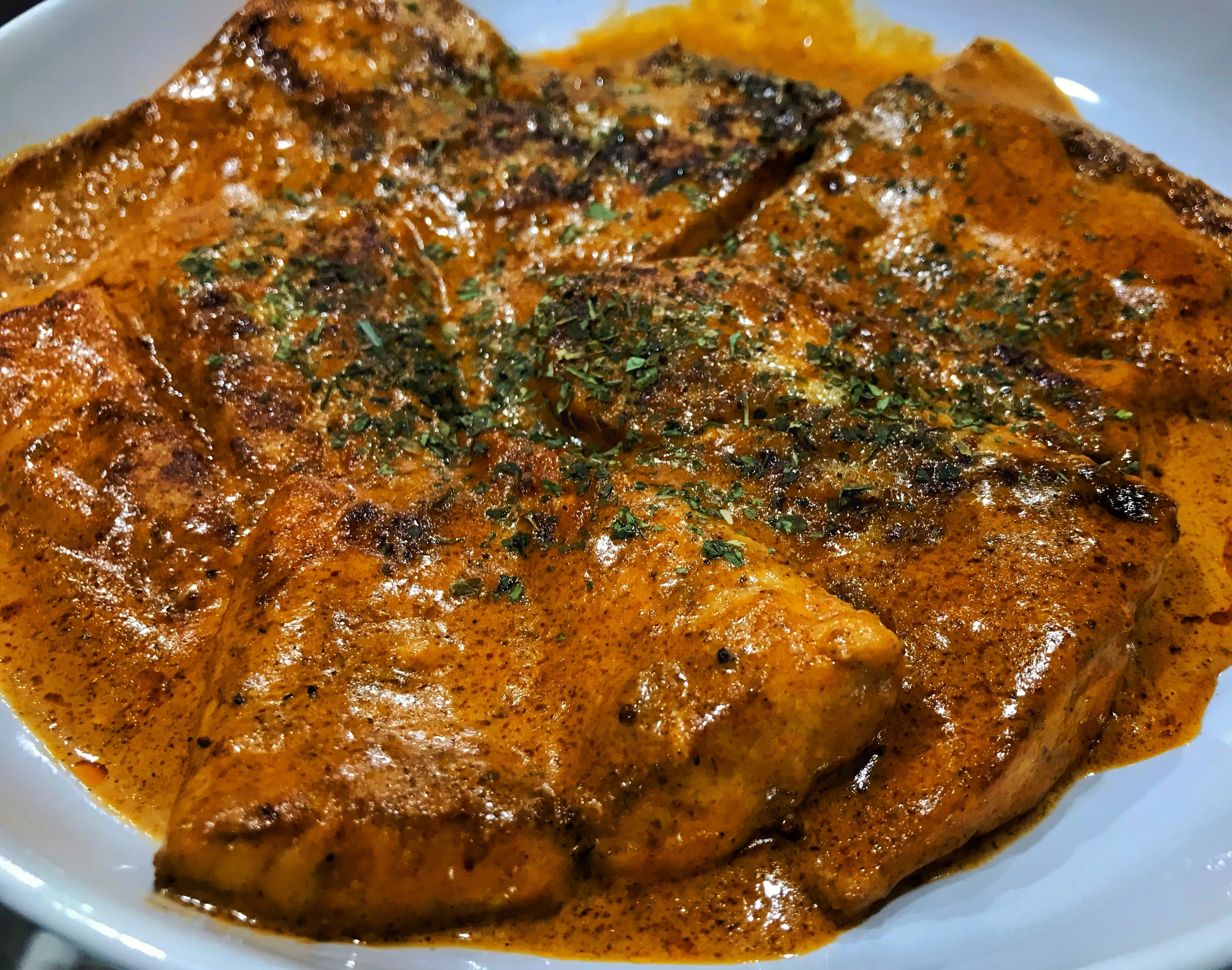 Blackened Sea bass with Chilau Garlic Pepper Cream Sauce